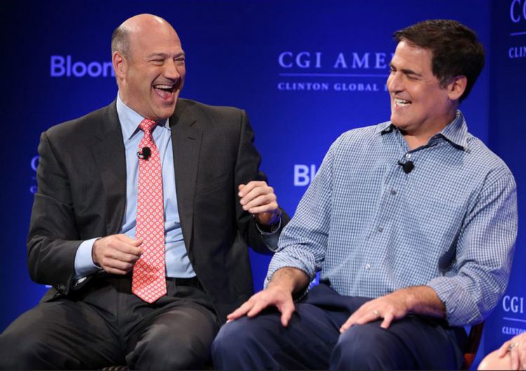 photo of Gary Cohn, president and chief operating officer of Goldman Sachs Group Inc., left, shares a laugh with entrepreneur Mark Cuban during a panel discussion at the Clinton Global Initiative CGI America meeting in Chicago, Illinois. Makeup by Fine Makeup Art & Associates
