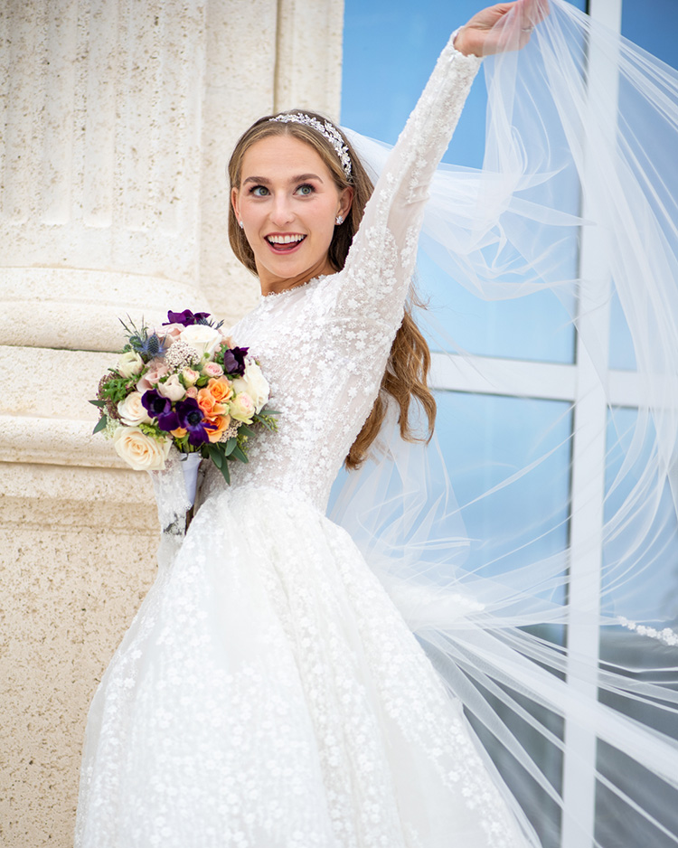 Orthodox Jewish Bride waving her veil in the wind