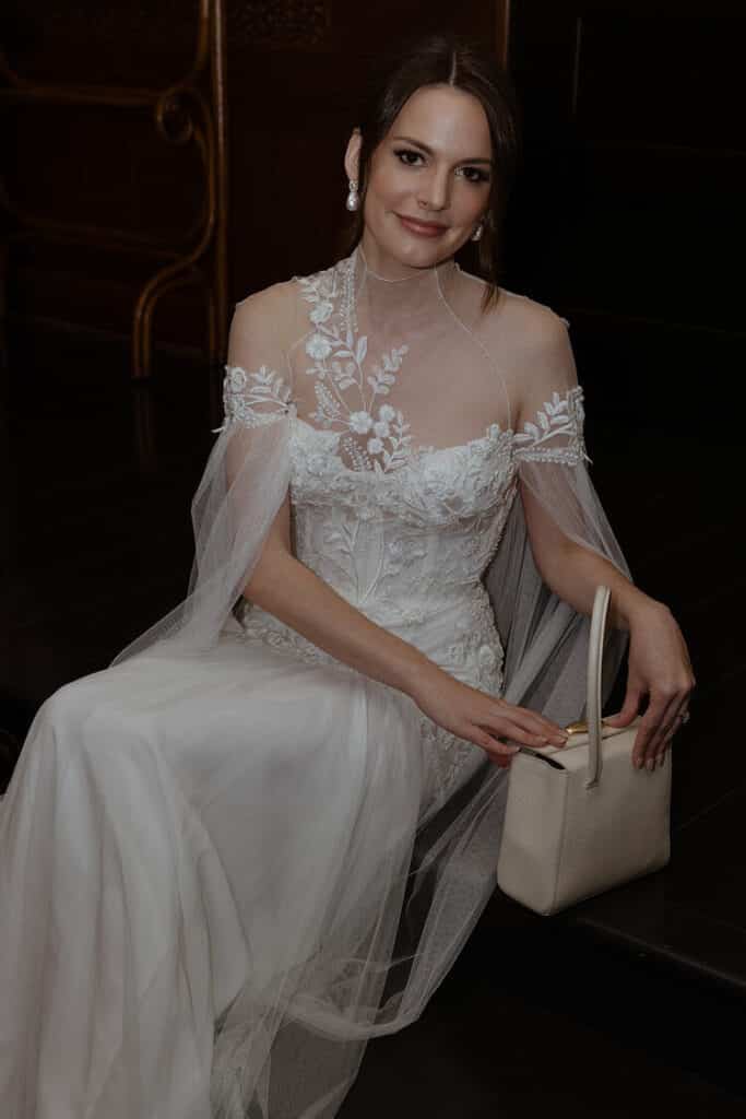 Bride with a soft sculpt, ethereal makeup look in a soft, flowing wedding dress