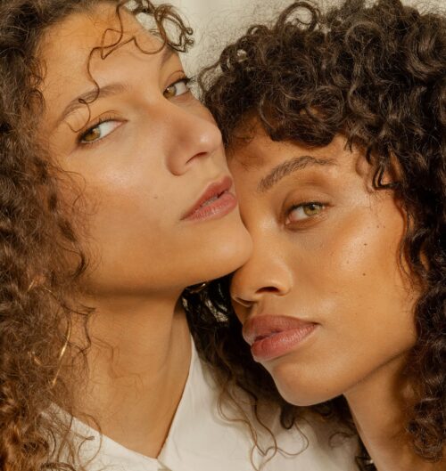 natural makeup on two models with diverse skin tones